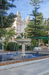  Alameda de Apodaca with a fountain and the Church of Our Lady of Carmen and Santa Teresa in Cadiz, Spain - obrazy, fototapety, plakaty