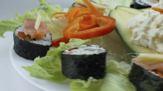 Stuffed Avocadoes, Suchi and Salad Toast Spinning Side View