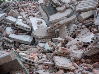 Rubble of destroyed/demolished brick buildings. 
