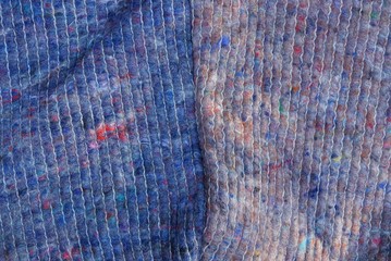 blue gray background fabric of crumpled wool sweaters