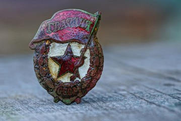 old guards soviet medal on a gray table