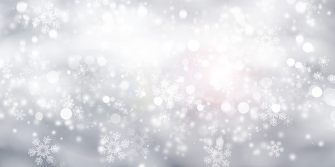 Fototapeta na wymiar white snow blurred abstract background. bokeh christmas blurred beautiful shiny Christmas lights