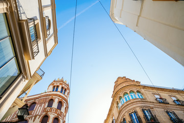 Fototapeta na wymiar low angle view of old buildings in Seville, Spain