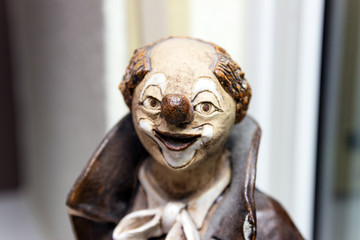 Statuette of a clown, ceramic clown figure.