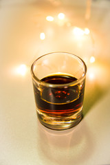 Bitter bitter with blurred lights in the background