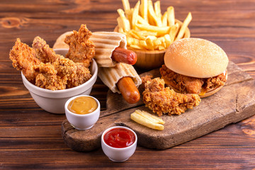Delicious but unhealthy food with ketchup and mustard