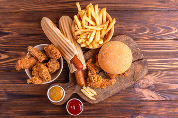 Delicious but unhealthy food with ketchup and mustard