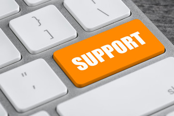 Modern computer keyboard on table, closeup view