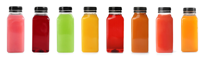 Set with plastic bottles of different juices on white background - obrazy, fototapety, plakaty