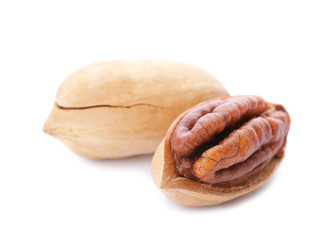 Pecan nuts on white background. Nutritive food
