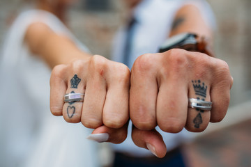 couple showing of their wedding rings