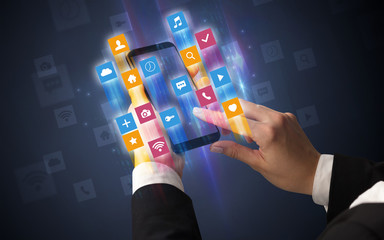 Female hand using smartphone with colorful angular fast switching application icons around