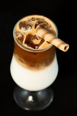 Alcoholic coffee cocktail with coffee liqueur and milk