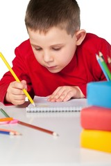 School Children Drawing on Notebook