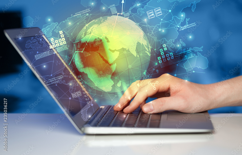Poster hand using laptop with global reports and stock market change concept