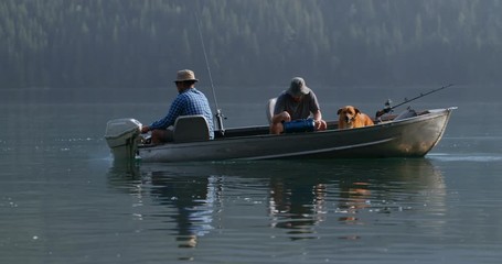 Two fishermen fishing in the river 4k - Powered by Adobe