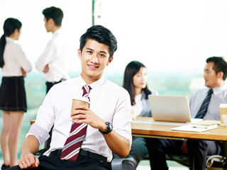 portrait of successful young asian businessman