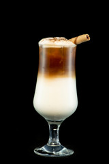 Alcoholic coffee cocktail with coffee liqueur, fresh cream and milk