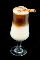 Alcoholic coffee cocktail with coffee liqueur, fresh cream and milk