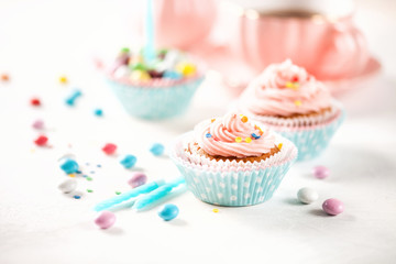 Strawberry cupcakes with color candies