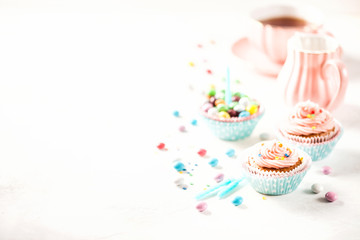 Strawberry cupcakes with color candies