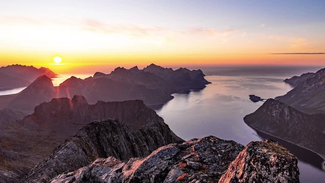 Sunset over Senja island, Mount Segla and fjords as seen from Mount Keipen