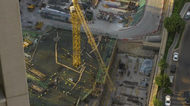 Steady shot of a panning crane at a building site, Dubai, UAE