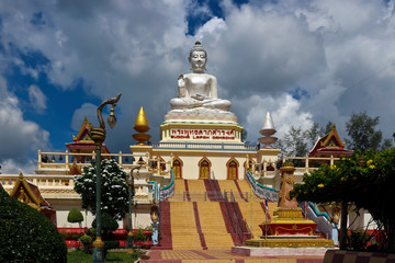 Fototapeta premium buddhist temple in thailand with large buddha