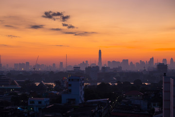 Sunrise scence of Bangkok . Orange sky in the morning at sunrise in Bangkok.
