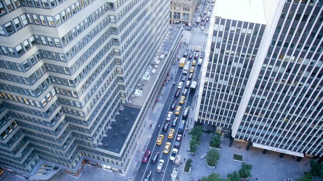Looking down on New York City traffic at a standstill during the day. Footage shot from high angle looking down.