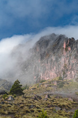 mountain peak over forest