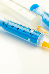 Close-up of a syringe on a light background