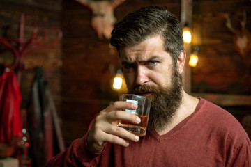 Drunk man. Whiskey, brandy, cognac concept. Drink barman. Pub retro vintage interior. Hipster barman concept. Alcohol addiction.