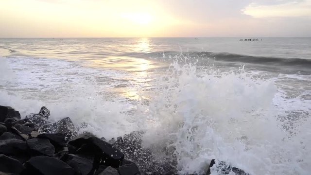 Slow motion of waves in the ocean during sunrise part 2 .