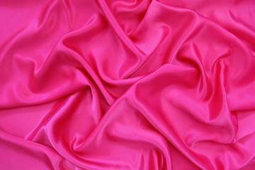 Romantic pink fabric texture with soft folds - perfect for background