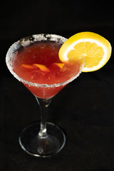 Cosmopolitan Cocktail with cranberry juice, vodka, lime juice and cointreau