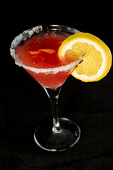 Cosmopolitan Cocktail with cranberry juice, vodka, lime juice and cointreau