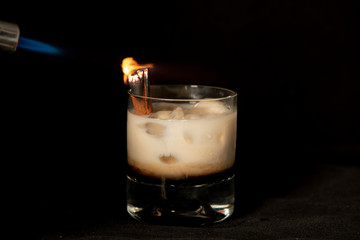 Flaming Cinnamon cocktail with kahlua, baileys irish cream and sambuca