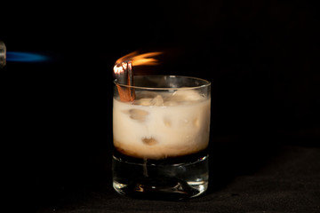 Flaming Cinnamon cocktail with kahlua, baileys irish cream and sambuca