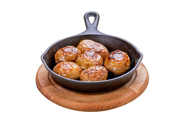 Baked whole potatoes in the pan. On a white background.