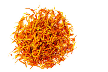 Naklejka premium Dried orange inflorescences of safflower dye lie in the form of a circle. Latin name carthamus tinctorius. Isolated on white background. Copy space.