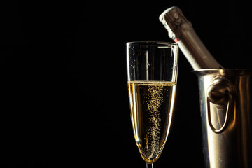Champagne on the black background