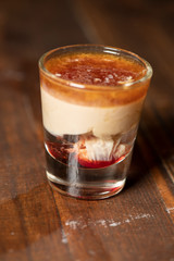 Brain Hemorrhage shot cocktail with schnapps, baileys irish cream and grenadine