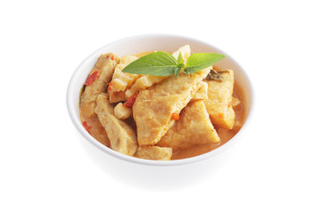 Thai style tofu red curry,  vegetable food white background
