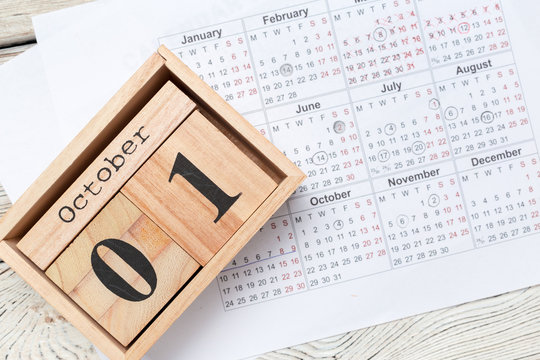 October 1st .October 1 white wooden calendar on  wood abstract background.Autumn day