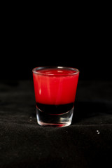 Red shot cocktail with jagermeister, cranberry juice and schnapps