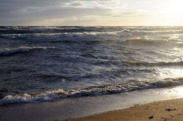 Stormy weather on the coast of Ladoga lake at sunset Karelia Russia