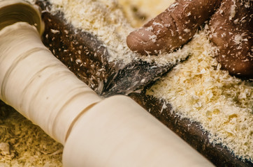 Carpenter working on woodworking machines in carpentry shop. Joiner carpenter workplace. Handmade and craft furniture concept