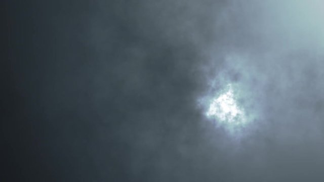 lightning behind thunderstorm clouds