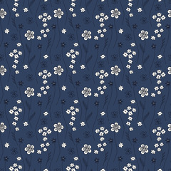 Joli motif harmonieux de petites fleurs sur fond bleu foncé. Fond abstrait avec des fleurs et des feuilles décoratives. Il peut être utilisé pour les sites Web, l& 39 emballage de cadeaux, les tissus, les papiers peints. Vecteur